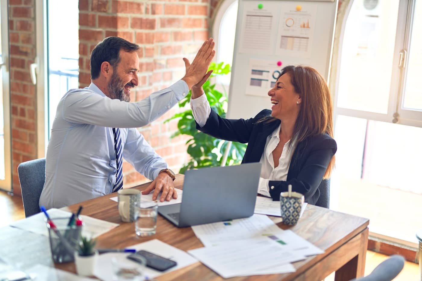 An operations team working together in an office